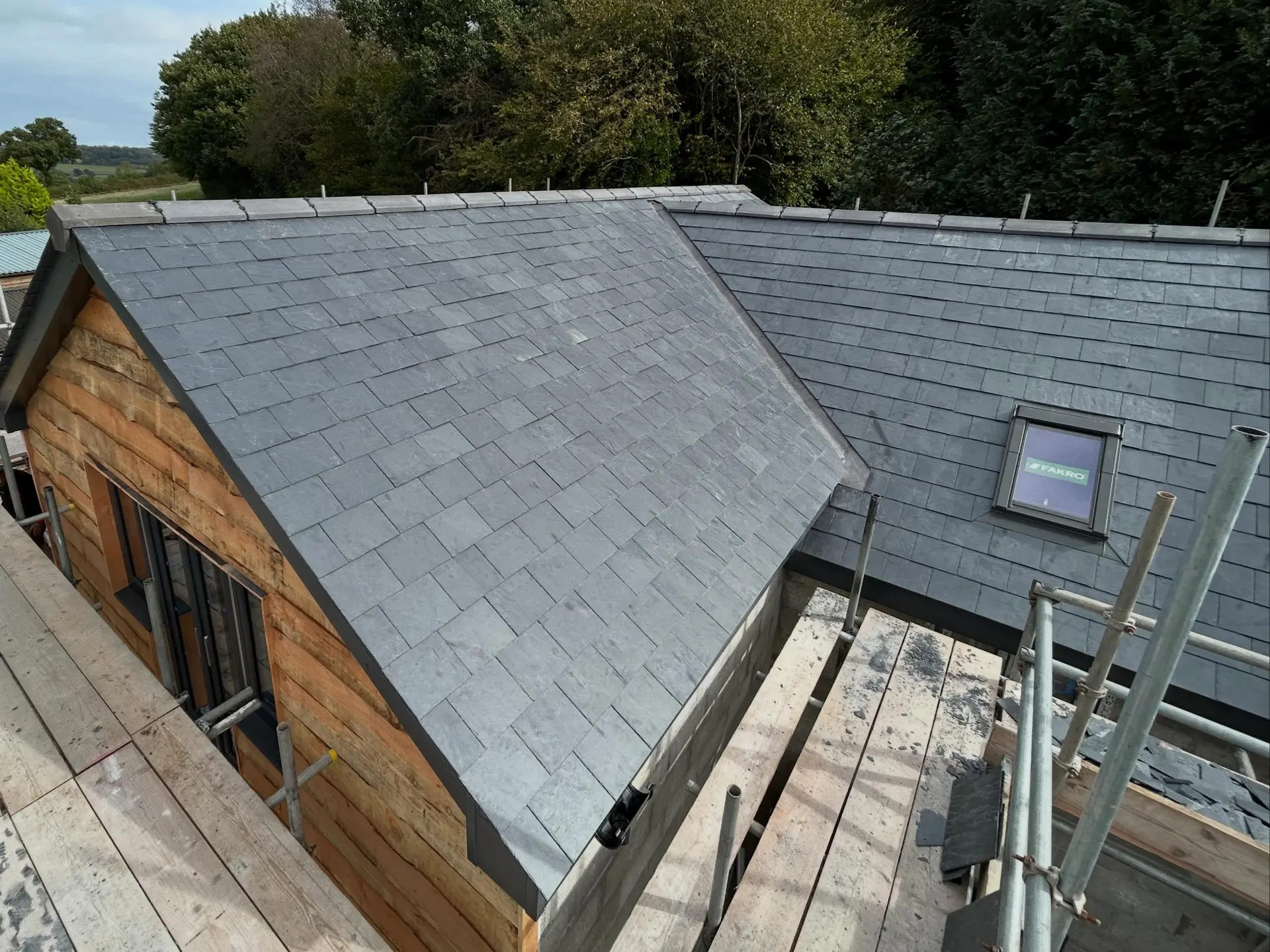 Completed slate roof by Mountain Roofing